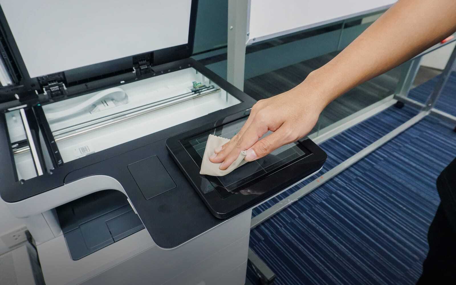 How Can I Clean My Copier Without Damaging the Screen or Other Features?