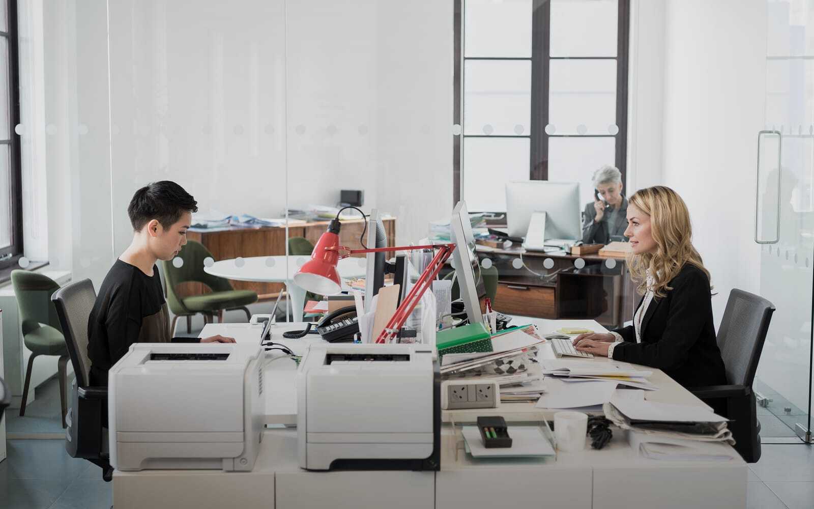 We've Got Several Desktop Printers in Our Office. Can We Cut Costs with a Single Multi-Function Copier?